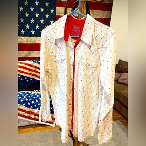 White, multicolored pearl snap shirt.